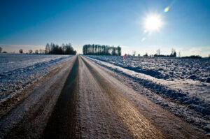 Black ice on a country road - slippery conditions 
