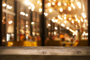 Bar table with blurred cafe background representing dram shop liability